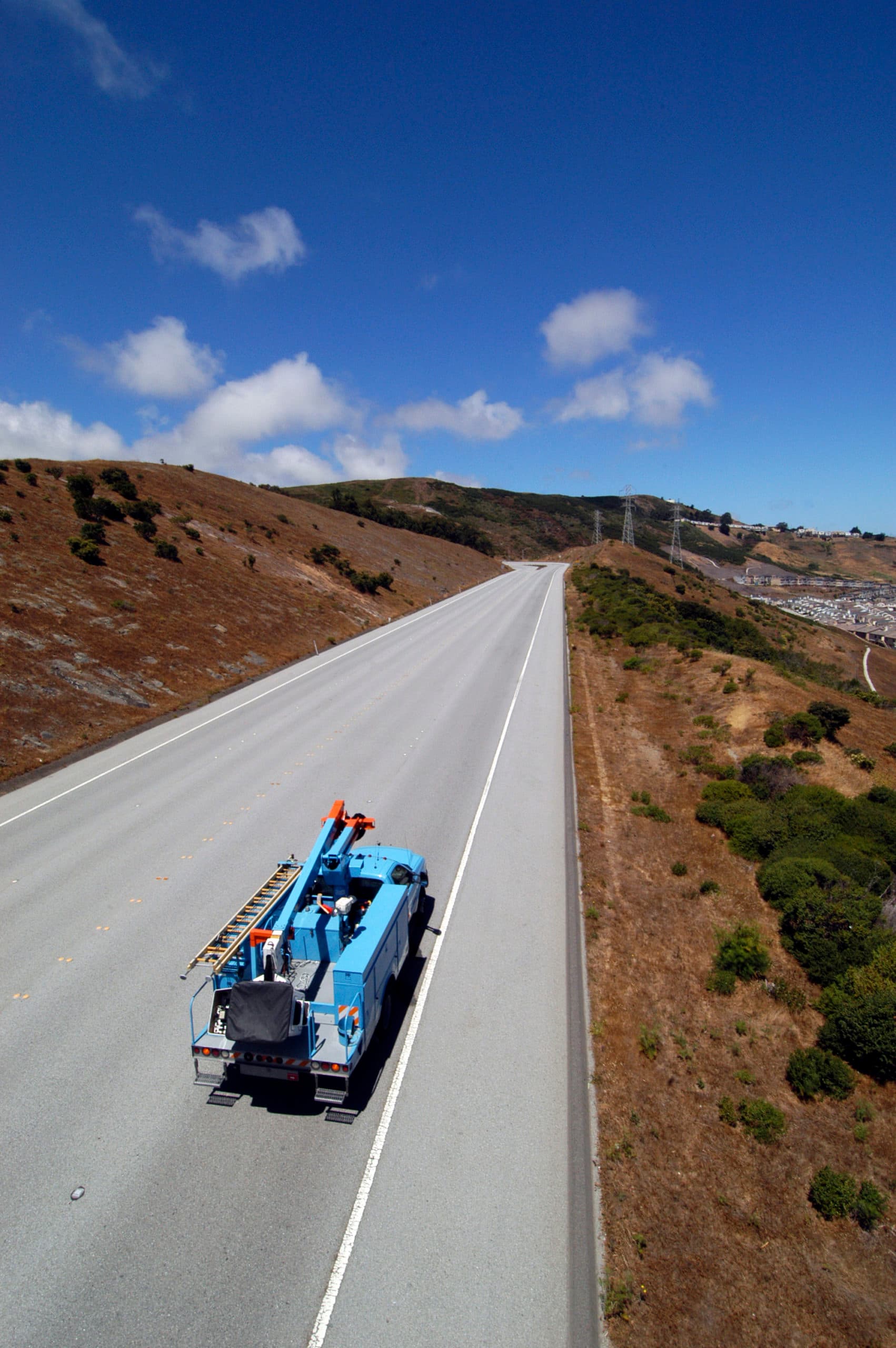 Utility truck on an open road